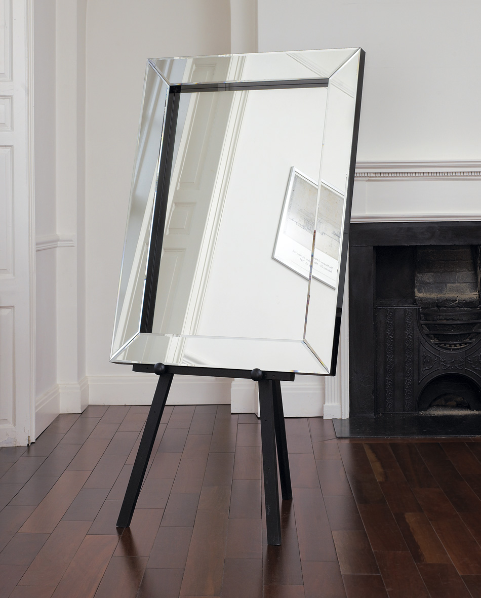 Large mirror in location setting